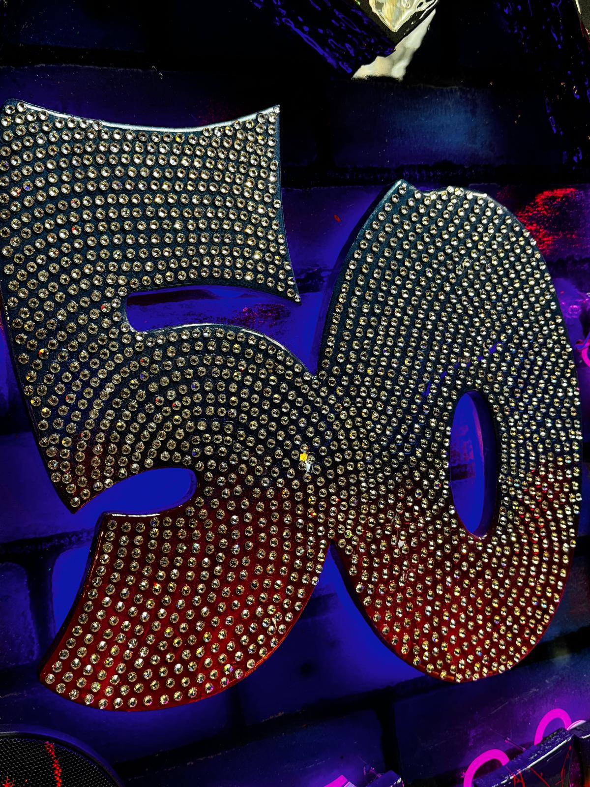 Swarovski crystal-embellished epoxy artwork with sound and lighting control.