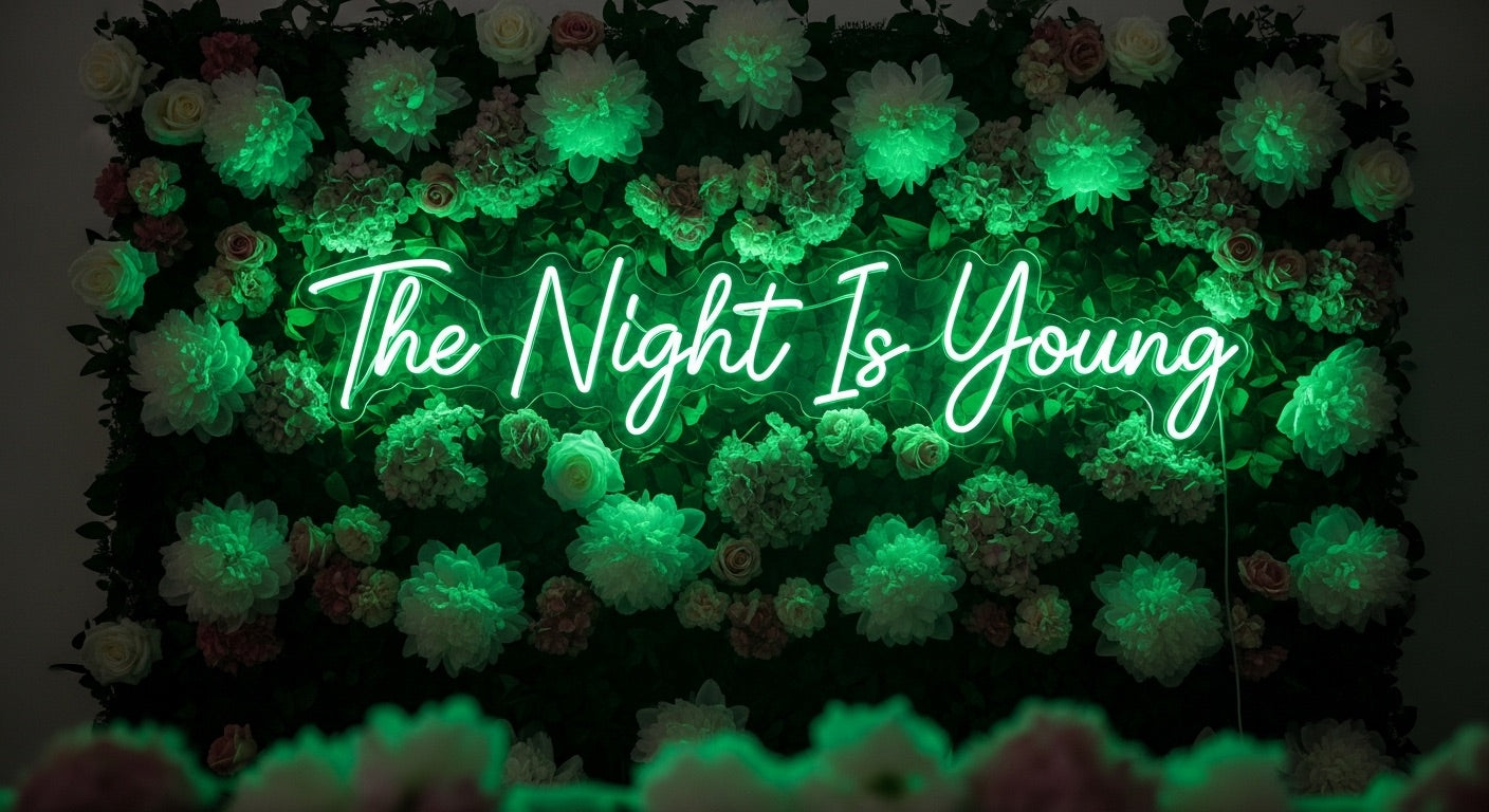 The Night Is Young Neon Sign - green neon on flower background
