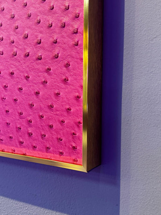 Spirit Orb – Pink Blush (24" x 24") by Paul Makovski, a optical illusion artwork featuring a reflective orb set against pink ostrich-textured leather.