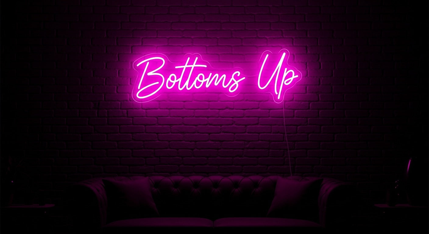 Bottoms Up Neon Sign - pink neon on brick background