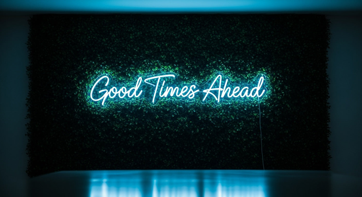 Good Times Ahead Neon Sign - ice blue neon on grass background