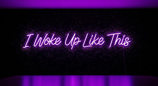 I Woke Up Like This Neon Sign - purple neon on grass background
