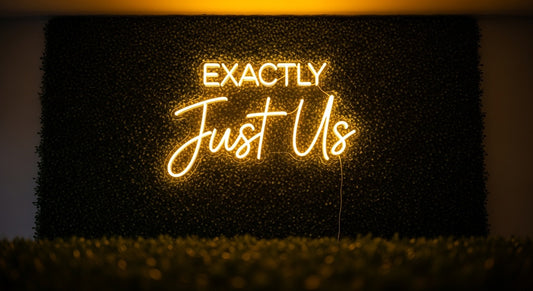 Just Us Neon Sign - yellow neon on grass background