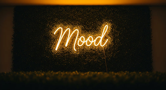 Mood Neon Sign - yellow neon on grass background