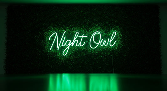 Night Owl Neon Sign - green neon on grass background