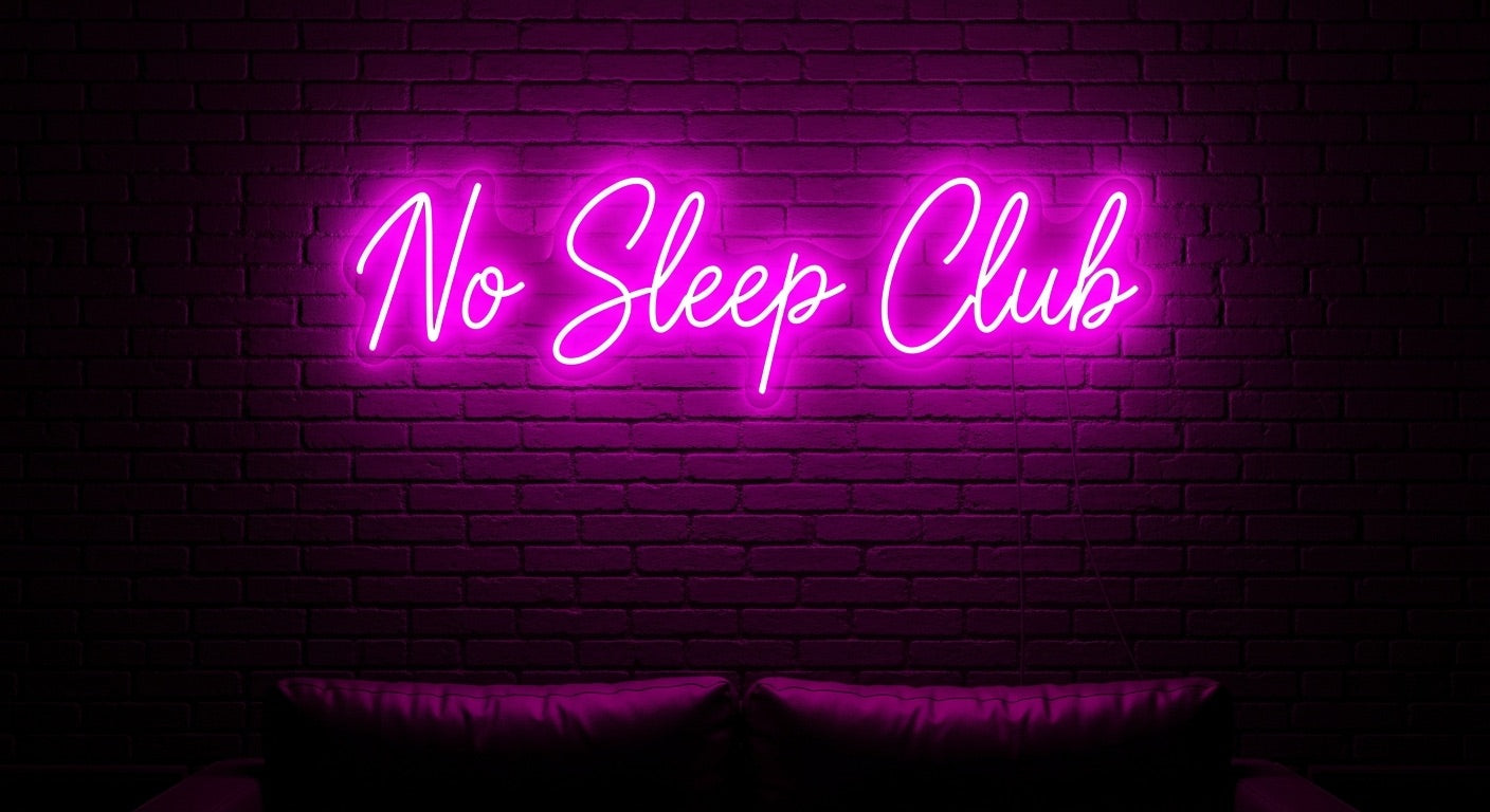 No Sleep Club Neon Sign - pink neon on brick background