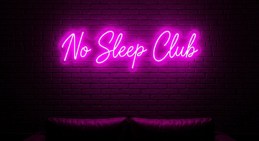 No Sleep Club Neon Sign - pink neon on brick background