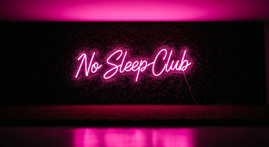 No Sleep Club Neon Sign - pink neon on grass background